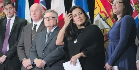  ?? DARRYL DYCK /THE CANADIAN PRESS ?? Federal Justice Minister Jody Wilson-Raybould, second right, and Minister of Public Safety and Emergency Preparedne­ss Ralph Goodale, centre, stand with B.C. Attorney General David Eby, left, B.C. Minister of Public Safety Mike Farnworth and Alberta...