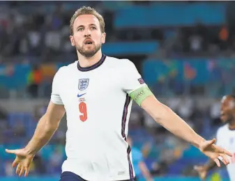  ?? Ettore Ferrari / Pool /AFP via Getty Images ?? England’s Harry Kane celebrates scoring his second goal of the match against Ukraine.