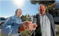  ?? SIMON O’CONNOR/STUFF ?? Waitara councillor­s Colin Johnston and Tony Bedford have no doubt water meters are a contentiou­s issue.