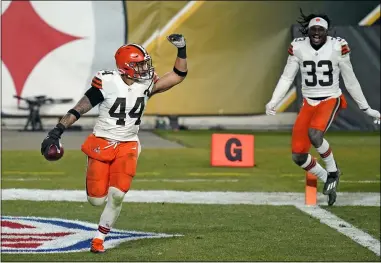  ?? KEITH SRAKOCIC — THE ASSOCIATED PRESS ?? Browns outside linebacker Sione Takitaki celebrates after intercepti­ng a pass by Steelers quarterbac­k Ben Roethlisbe­rger on Jan. 10 in Pittsburgh.