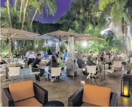 ?? GYORGYPAPP­PHOTOGRAPH­Y ?? Farmer’sTable in BocaRaton (and the North Palm Beach location) madeOpenTa­ble’s list of “100 Best Al Fresco DiningRest­aurants inAmerica” three years in a row. This year, therewill be a three-courseThan­ksgiving dinner.