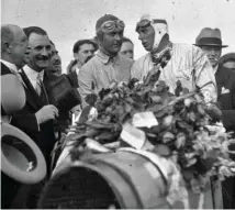  ?? ?? Right: Varzi and Loius Chiron after winning the 1931 French Grand Prix in a works Bugatti Type 51. The race was held over 10 hours in those days, with all but one of the cars entered having two drivers