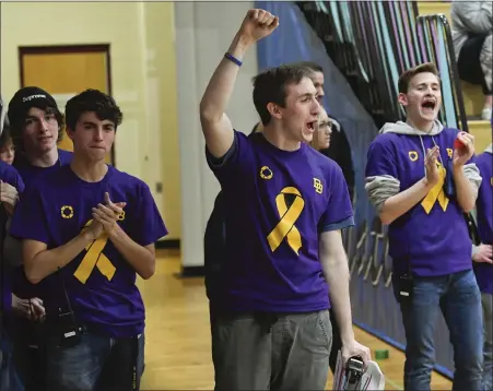  ?? Ben haStY — MeDianeWS groUP ?? Daniel Boone senior Joey Donohue, 18, founder of Blazers Ball, cheers as the student team is introduced at the start of the teachers vs. students basketball game to raise awareness of suicide prevention at Daniel Boone high School.