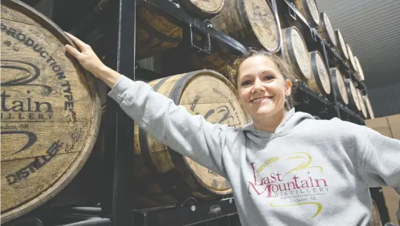  ?? RICHARD MARJAN ?? Last Mountain Distillery’s owners Meredith (pictured) and Colin Schmidt started their family-owned and operated business out of their two-car garage.