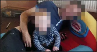  ??  ?? ‘Loved’: Father and son – with identities obscured – just before the boy was taken