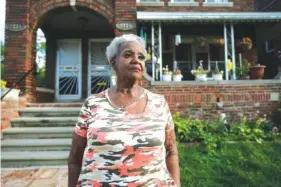  ?? AP PHOTO/PAUL SANCYA ?? Pamela Jackson-Walters stands outside her home in Detroit on Sept. 21.