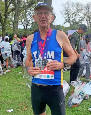  ?? ?? Team Bath AC’S Tom Hutchison after his superb Chicago marathon