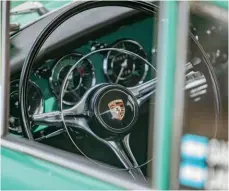  ??  ?? Below: Dashboard is just one area of the car that has been beautifull­y detailed. Black and green dials, chrome trim all set against Smryna
Green. Wonderful
