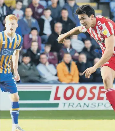  ??  ?? Luke O’Nien opens his Sunderland account at Shrewsbury Town.