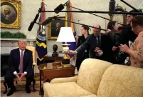  ?? (Jonathan Ernst/Reuters) ?? US PRESIDENT Donald Trump speaks to reporters in the Oval Office on Friday.