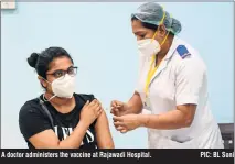  ??  ?? A doctor administer­s the vaccine at Rajawadi Hospital.