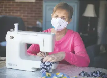  ?? DAX MELMER ?? Nancy Stammler works on sewing masks at her Windsor home. While the masks aren’t for medical use, they are for those who would like to wear something, rather than nothing.