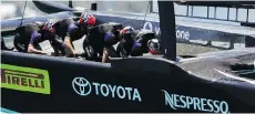  ?? GREGORY BULL /THE ASSOCIATED PRESS ?? Emirates Team New Zealand cyclists provide pedal power during a race last weekend in Bermuda.