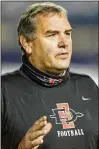  ?? GEORGE FREY/AP ?? Brady Hoke, 65, is out at San Diego State at the end of the season. Hoke, who is in his second stint as the Aztecs’ coach, won a program-record 12 games in 2021.