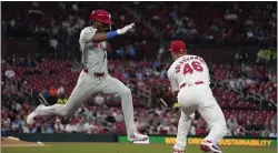  ?? JEFF ROBERSON — THE ASSOCIATED PRESS ?? The Phillies’ Johan Rojas, left, grounds out as St. Louis Cardinals first baseman Paul Goldschmid­t handles the throw during a game Tuesday in St. Louis.