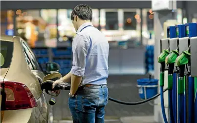  ??  ?? Petrol at $3 a litre would cost the average household an extra $18 a week, an economist says.