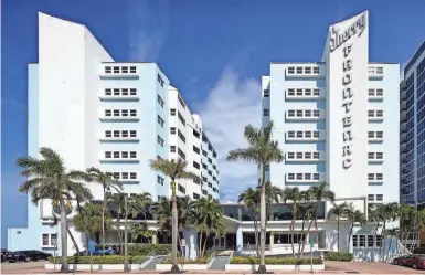  ?? PHOTOS BY MORIS MORENO/NEW YORK TIMES ?? The “saw-tooth” design of The Sherry Frontenac Hotel’s two towers, built in 1947, provide the side rooms of the Miami Beach structure maximum light and ocean views.