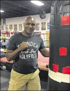  ?? JEFF SCHULTZ / JSCHULTZ@AJC.COM ?? Evander Holyfield trains at The Heavyweigh­t Factory in Fort Lauderdale, Fla., in May.