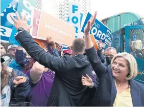  ?? THE CANADIAN PRESS ?? NDP Leader Andrea Horwath questioned how PC Leader Doug Ford expects to peel off working-class votes given his past freeze of the minimum wage, salary cap for nurses and lukewarm embrace of pandemic paid sick leave.