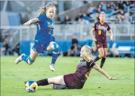  ?? Percy Anderson UCLA Athletics ?? UCLA’S Ashley Sanchez avoids an Arizona State defender. “The things she does on the ball, no one in the country does,” coach Amanda Cromwell said.