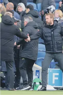  ?? ?? Graham Potter shakes Dean Smith’s hand