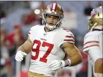  ?? RICK SCUTERI — THE ASSOCIATED PRESS ?? San Francisco 49ers defensive end Nick Bosa prior to a game against the Cardinals on Oct. 31in Glendale, Ariz.