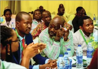  ?? ?? The Bet9ja team at the NFIU Anti-Money Laundering/Terrorism Financing Training led by the man in suit with a red tie, Adewale Akande, the company’s Chief Compliance Officer