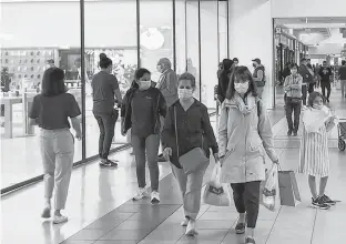  ?? REUTERS FILES/NICHOLA SAMINATHER ?? Shoppers visit Fairview Mall in the Toronto suburb of Yorkdale in a still image from video taken on Oct. 13.