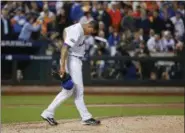  ?? AP FILE ?? Mets closer Jeurys Familia walks back up during ninth inning of Mets wild-card game loss against Giants.