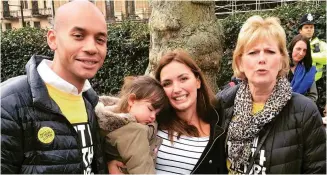  ??  ?? Protest: Miss Patalong and her two-year-old daughter with Chuka Umunna and Anna Soubry on Saturday