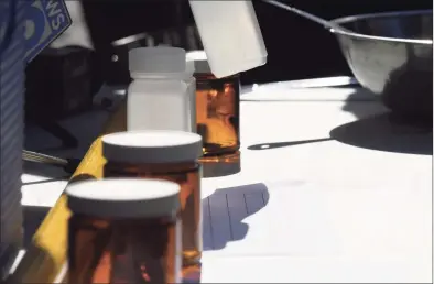  ?? Will Waldron / Albany Times Union file photo ?? Containers used to collect soil and water samples to check for PFAS are displayed during a New York State Department of Conservati­on press conference on Oct. 1, 2020, in Cohoes, N.Y.