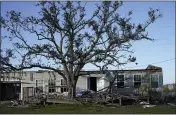  ??  ?? A destroyed home is seen in the aftermath of both Hurricane Laura and Hurricane Delta, in Grand Lake, La., on Dec. 4.