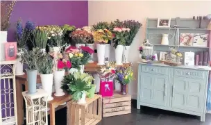  ??  ?? ●● Flowers at the Mustard Seed Florist, which has moved premises to Tytheringt­on Business Park