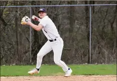  ?? Pete Paguaga / Hearst Connecticu­t Media ?? Lyman Hall’s Justin Hackett throws to first against at Pat Wall Field in Wallingfor­d on April 16.