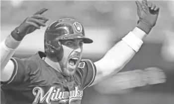  ?? JEFFREY PHELPS, ASSOCIATED PRESS ?? Travis Shaw celebrates his game-winning two-run home run.