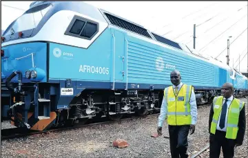 ??  ?? Transport Minister Joe Maswangany­i and acting Prasa chief executive Lindikhaya Zide inspect Afro 4000 locomotive­s. Maswangany­i wants the probes into Prasa to come to a close as ‘they have been going on for too long’. Picture: Itumeleng English