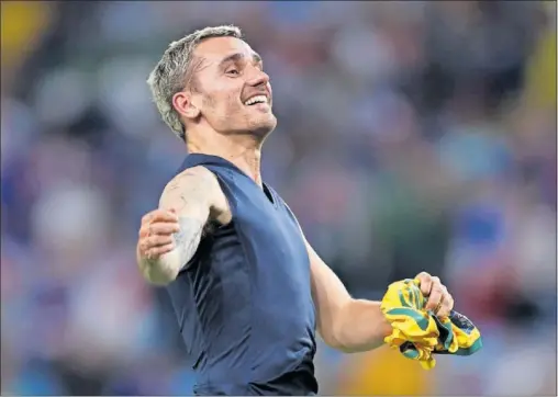  ?? ?? Griezmann celebra el triunfo de la selección francesa contra Australia en el Mundial.