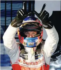  ??  ?? Great start: Mclaren Mercedes driver Jenson Button of Britain gestures after winning the F1 Australian Grand Prix in Melbourne, the first race of the season, on Sunday. – AFP