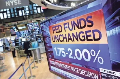  ??  ?? The Federal Reserve is leaving its benchmark interest rate unchanged while signaling additional rate increases in the months ahead as long as the economy stays healthy. RICHARD DREW / AP