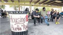  ?? WILLIE J. ALLEN JR./ORLANDO SENTINEL ?? Florida Rising (formerly Organize Florida) stages a caravan demonstrat­ion to discuss the group’s focus on affordable housing and tenants’ rights in Orlando on April 24.