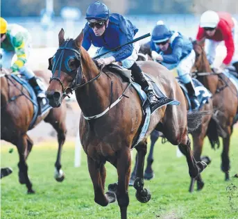  ?? OPPORTUNIT­Y: Josh Adams rides Happy Clapper to victory in the Tattersall­s Club Tramway Stakes. ??