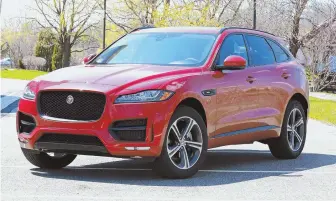  ?? STAFF PHOTO BY MATT WEST ?? SPORTY LUXURY: Jaguar’s F-Pace in R-Sport trim gives the feeling of total command of the road, with solid handling, power and upscale trim.