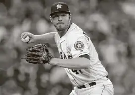  ?? Karen Warren / Houston Chronicle ?? Astros reliever Chris Devenski was his reliable self while tossing two effective innings against the Athletics on Thursday at Minute Maid Park.