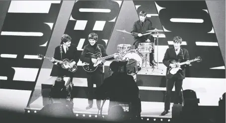  ?? MARK AND COLLEEN HAYWARD/REDFERNS ?? Author Craig Brown has found an entertaini­ng way to celebrate The Beatles, seen here performing in 1963.