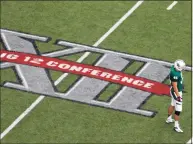  ?? Tony Gutierrez / Associated Press ?? Big 12 members Texas and Oklahoma took the first formal step Monday toward moving to the Southeaste­rn Conference, notifying the Big 12 they would not be renewing an agreement that binds the league’s members through 2025.