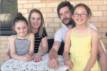  ??  ?? REMEMBERIN­G RALEIGH: The Hateley-heath family, from left, Ava Heath, 8, Anna Heath, Leighton Hateley and Belle Heath, 11, have donated a Cuddle Cot to Naracoorte Hospital in honour of their daughter and sister, Raleigh.