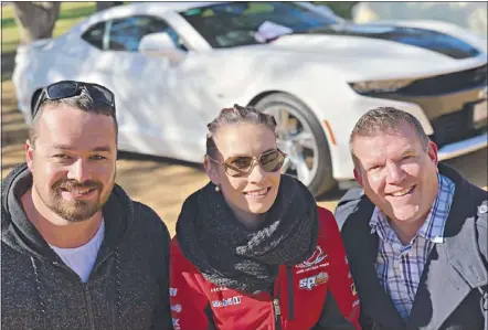  ??  ?? James Scott and Samantha Martin from Golden West Automotive, with Member for Dubbo Dugald Saunders, in front of the Chevrolet Camaro helping promote the Pinknats Charity Show & Shine. PHOTO: DUBBO PHOTO NEWS