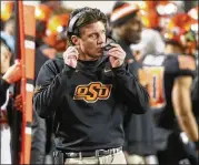  ?? SUE OGROCKI / ASSOCIATED PRESS ?? After drawing interest from Tennessee for its vacancy, coach Mike Gundy landed a $675,000 annual raise from Oklahoma State.