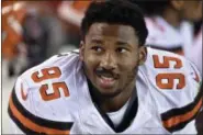  ?? ASSOCIATED PRESS FILE ?? Myles Garrett sits on the bench during the first half of a preseason game against the Saints in Cleveland.