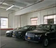  ?? SIMON ANDERSON VIA AP ?? Cars sit inside the luxury parking condominiu­m The Parking Club in the Brooklyn borough of New York. If you live in a city and have a car, it can be tough finding an affordable space for it. Luckily, a slew of apps and other online services have...
